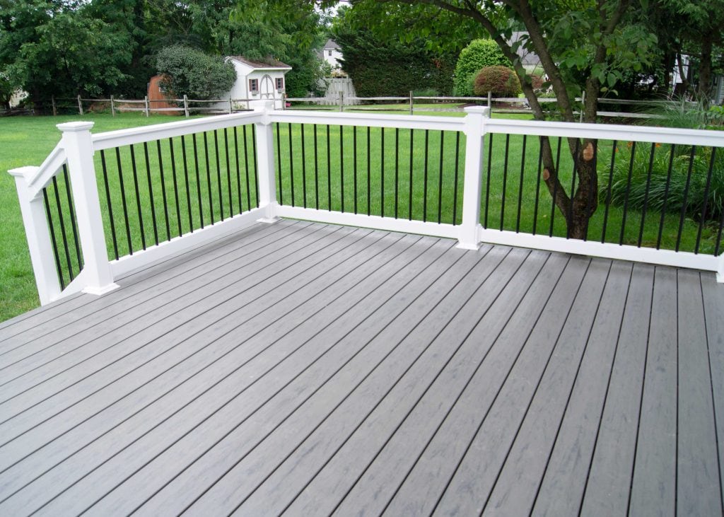 Deck railing adds security and aesthetic value to a deck on a residential property